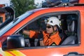 A Basarnas rescue team communicating in a car