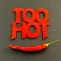 Base background inscription menu inscription too hot hot chili peppers long pod on a black background colorful base design