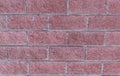 Base brick wall terracotta row of rectangular stones with gray lines background urban part of the fort