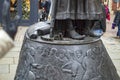 The base of bronze statue of Geoffrey Chaucer in kent canterbury town Royalty Free Stock Photo