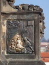 Base of John of Nepomuk statue on the Charles bridge in Prague