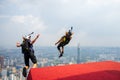 A BASE jumpers in jumps off from KL Tower.