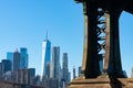 Base of the Manhattan Bridge along the East River with the Lower Manhattan Skyline in New York City Royalty Free Stock Photo