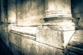 Base of the marble columns of a romanesque Italian church - toned image Royalty Free Stock Photo