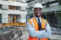 We base our success on your satisfaction. Portrait of a confident young man working at a construction site. Royalty Free Stock Photo