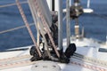 The base for securing the mainsail on the deck of a cruise yacht. Folding carriages and ropes for raising sails. Bermuda sloop equ