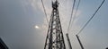 The base transceiver station tower is covered in white clouds