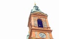 Base walk along Prague Smichov Basilica of Saint Wenceslas church clock tower with pyramidal roof with copy space. Czech Republic