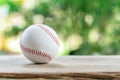 Baseball on Abstract background and red stitching baseball. White baseball with red thread.Baseball is a national sport of Japan. Royalty Free Stock Photo