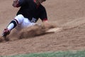 Baseball Action Image - Feet first slide into base