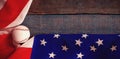 Baseball and American flag on wooden table Royalty Free Stock Photo