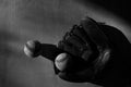Black and white darkness over baseball glove and balls