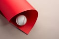 Baseball ball on grey and red background with copy space Royalty Free Stock Photo