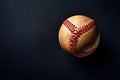 Baseball ball isolated on dark background. Top view. Royalty Free Stock Photo