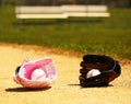 Baseball. Balls in Gloves on Field. Female vs Male Royalty Free Stock Photo