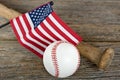 Baseball with bat and American flag Royalty Free Stock Photo