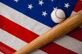 Baseball bat and ball on American flag Royalty Free Stock Photo