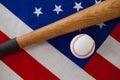 Baseball bat and ball on American flag Royalty Free Stock Photo