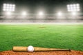 Baseball Bat and Ball on Field in Outdoor Stadium With Copy Space Royalty Free Stock Photo