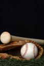 Baseball and Bat on black Royalty Free Stock Photo