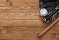 Baseball bat, glove and ball on wooden background. Sport theme background with copy space for text and advertisment