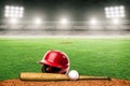 Baseball, Bat and Helmet on Field in Outdoor Stadium With Copy Space