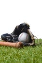 Baseball bat,shoes, glove and ball on green grass field. Sport theme background with copy space for text and advertisment Royalty Free Stock Photo