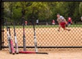 Baseball bats and players. Royalty Free Stock Photo