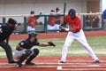 Baseball batter watches breaking ball