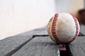 Baseball on a bench Royalty Free Stock Photo