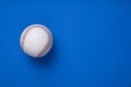 Baseball on blue table background Royalty Free Stock Photo