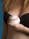 Baseball and breasts Royalty Free Stock Photo