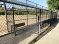 Baseball field chain link fence dugout practice playground empty ballpark sports park Royalty Free Stock Photo
