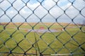 Baseball field under water behind the fence