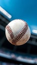 A baseball flying through the air in front of a baseball field Royalty Free Stock Photo