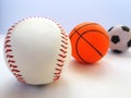 Baseball, football, basketball. Three sports balls on a light background for cards, banners, flyers.