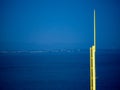 A baseball foul pole overlooking a body of water