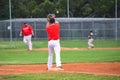 Baseball game, first baseman catching the ball thrown from the infielder during the ball game