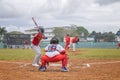 Baseball game with a pitcher on the mound, a catcher crouched behind home plate Royalty Free Stock Photo
