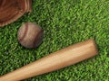 Baseball, glove, ball and bat on field Royalty Free Stock Photo