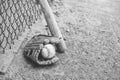 Baseball glove with ball on field Royalty Free Stock Photo