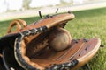Baseball Glove And Ball On Field