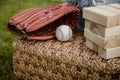 Baseball in a Glove in the Outfield. Baseball Mitt Glove with Ball. Wood blocks stack game with copyspace. Royalty Free Stock Photo