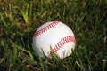 Baseball in grass