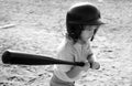 Baseball kid players in helmet and baseball bat in action. Royalty Free Stock Photo