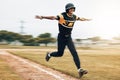 Baseball, man and running celebration on baseball field after scoring homerun. Exercise, fitness and winning baseball