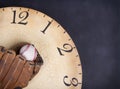 A baseball and mitt on an old vintage clock Royalty Free Stock Photo