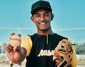 Baseball is my number one choice. Shot of a young baseball player wearing a baseball mitt and holding a ball. Royalty Free Stock Photo