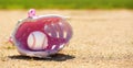 Baseball in Pink Female Glove