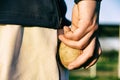 Baseball pitcher with ball in hand